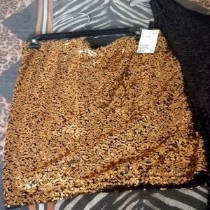 Two dresses and a skirt and shoes